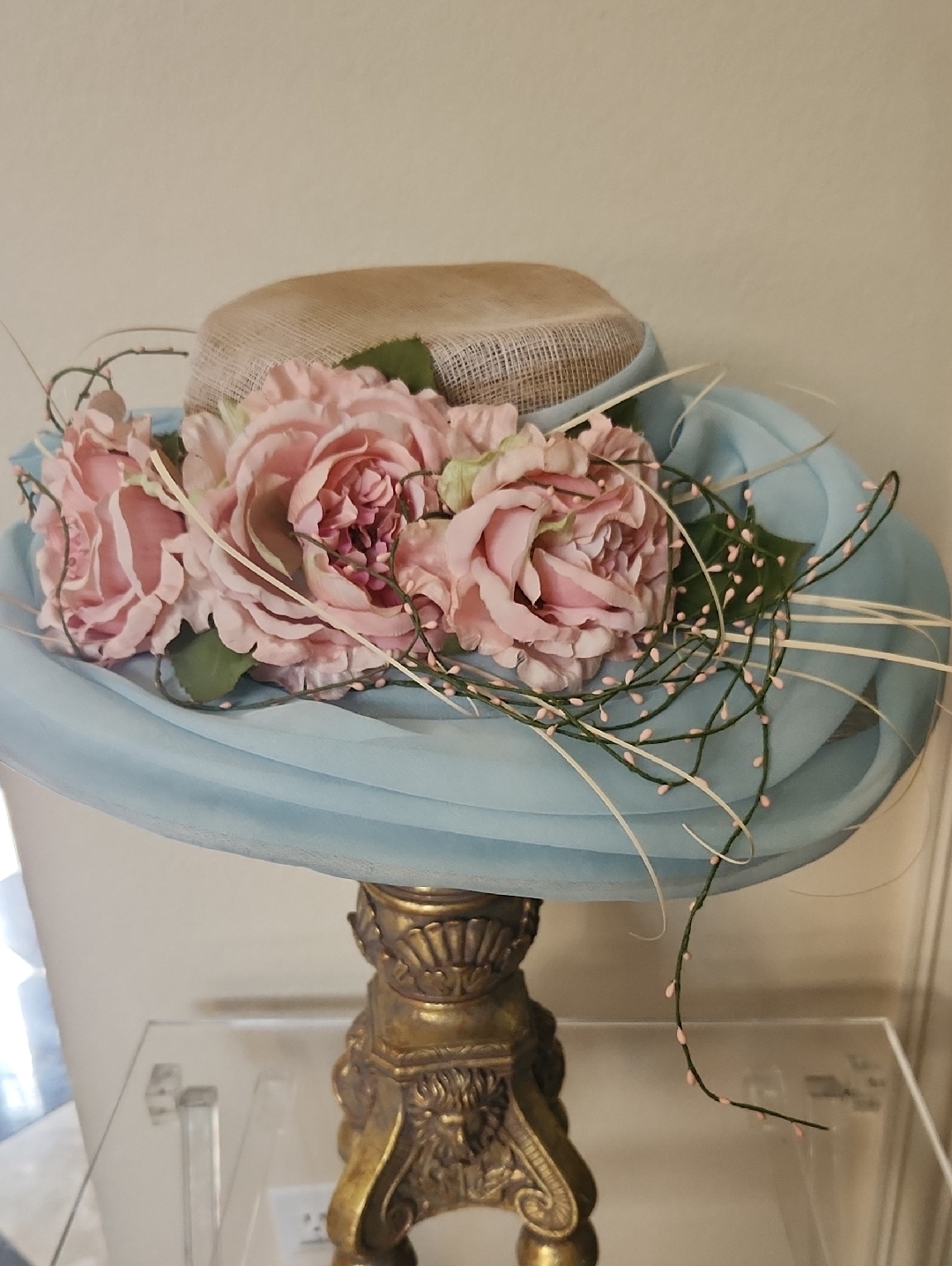 Vintage-Inspired Blue Straw Derby Hat With Pink Floral Trim